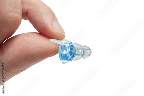 Human silicone earplugs hold fingers on white background