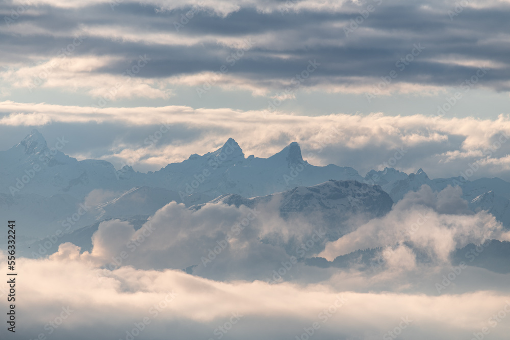 Sunrise in the mountains of switzerland on a cloudy winter day closeup