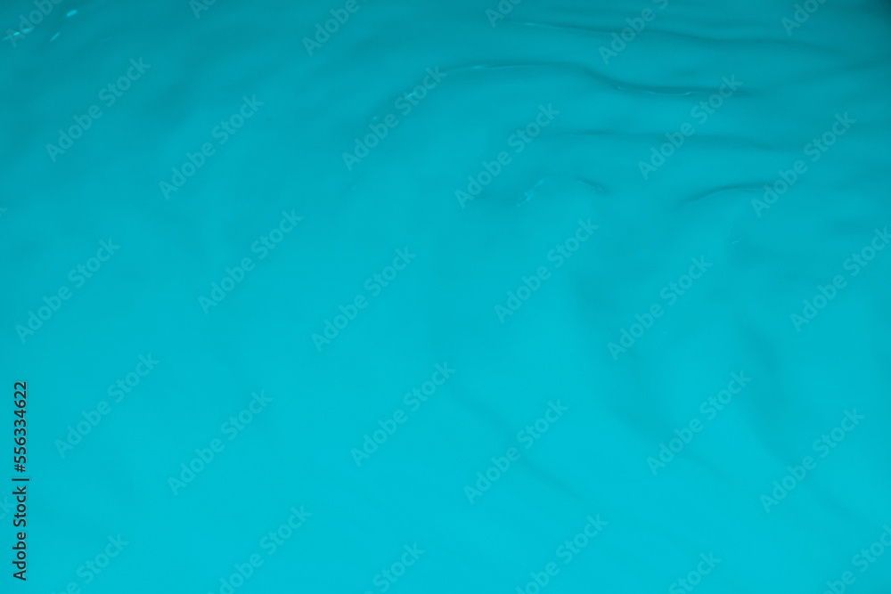 Fototapeta premium Blue liquid, waves, fluidity.