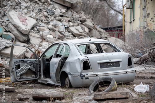 damaged and looted cars in a city in Ukraine during the war