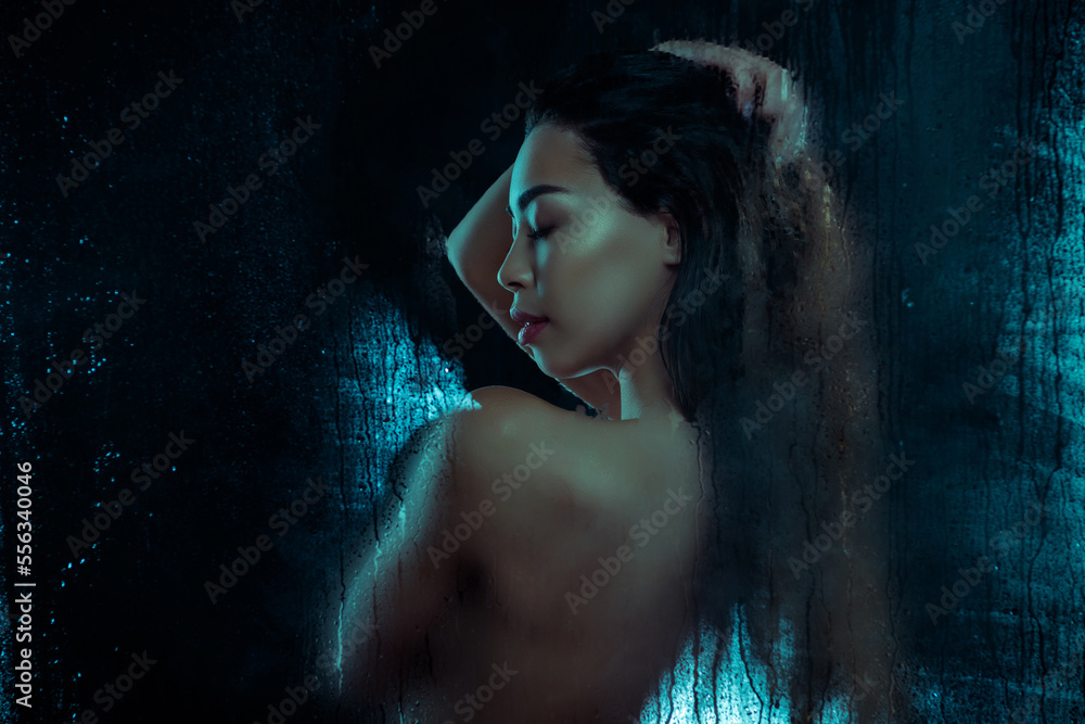 Photo of lady enjoy fresh moisturizing shampoo head and shoulders isolated on dark color background with droplets Photo of lady enjoy fresh moisturizing shampoo head and shoulders isolated on dark color background with droplets