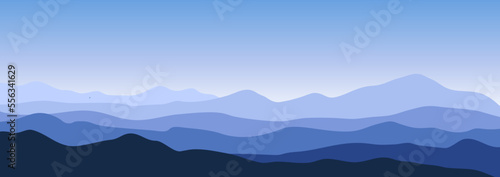 Mountains background. Horizontal wide panorama of blue mountains in the distance.