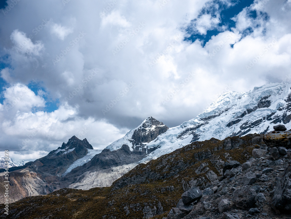 Mountain with snowy and cloudy sky in Peru South America