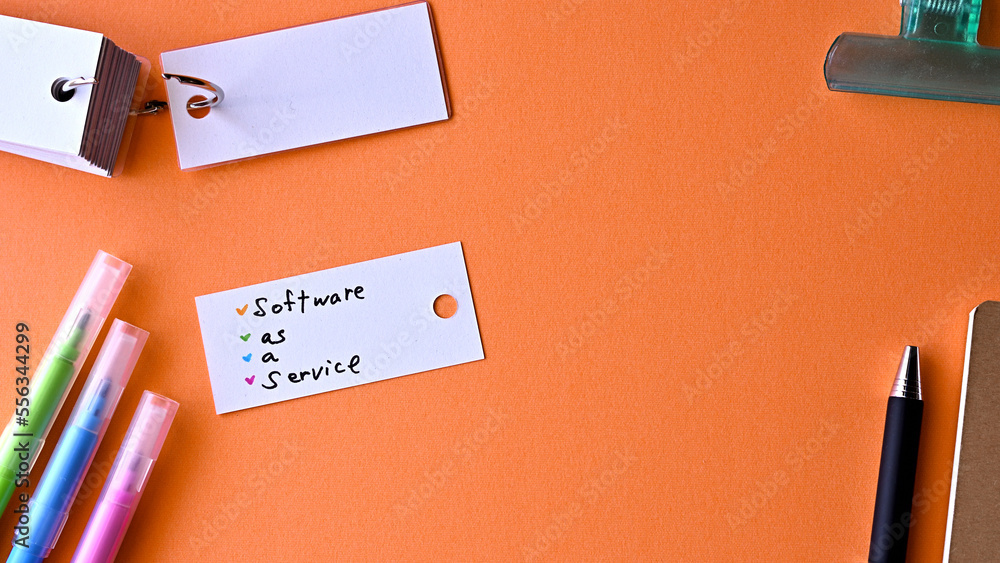 There is word card with the word Infrastructure as a Service on the desk. There is word card with the word Infrastructure as a Service on the desk.