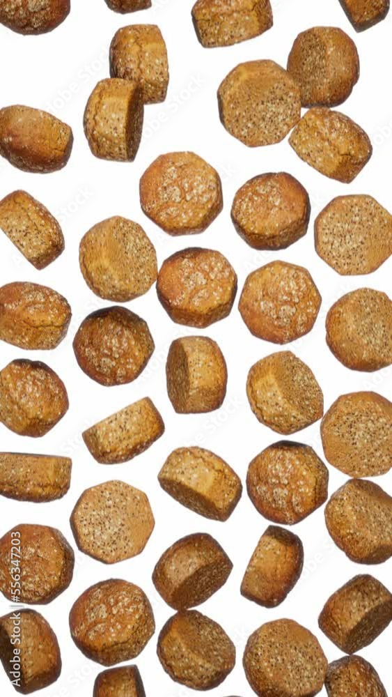 Vertically composed looping animation featuring a cloud of Brown Bread Rolls falling endlessly on white background. Vertically composed looping animation featuring a cloud of Brown Bread Rolls falling endlessly on white background.