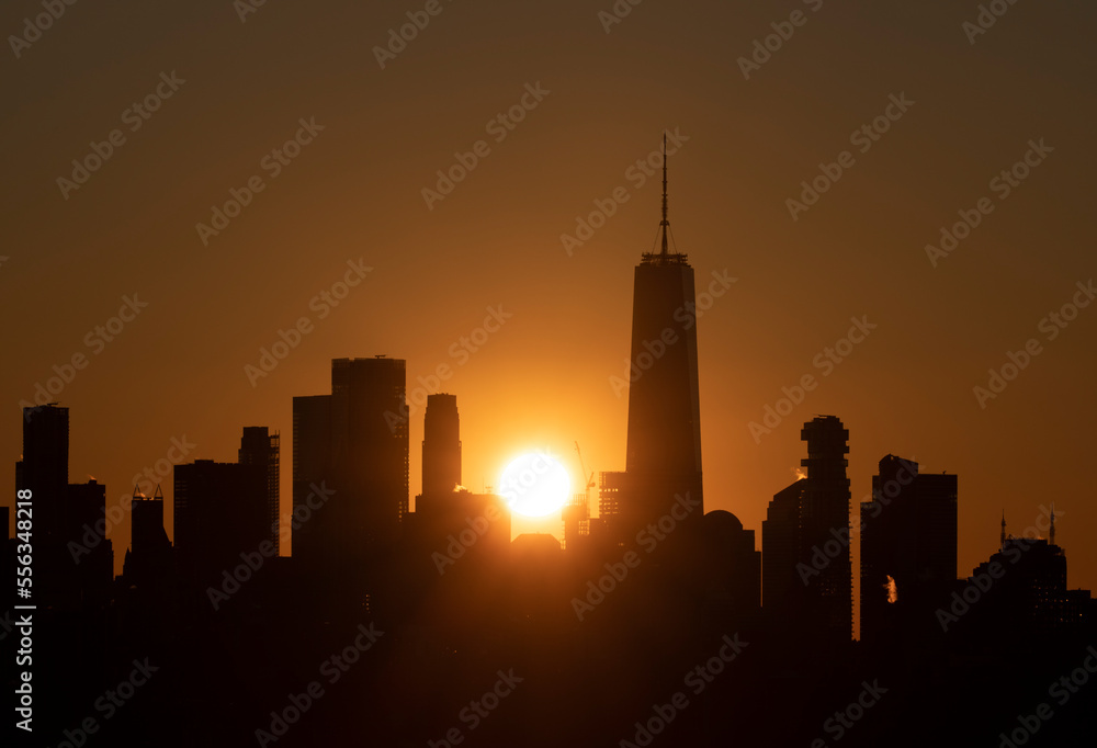 Sunset in the center of the Manhattan downtown skyline in New York City. 