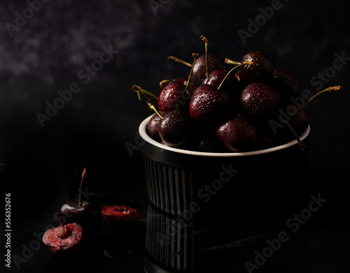Bowl of Cherries. Cherries in a Black Bowl. Bowl of Cherries with a Slate background