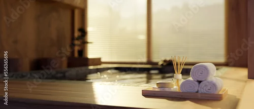 Fototapeta samoprzylepna Spa accessories and copy space on Onsen bath in beautiful and relax indoor Japanese Onsen spa room.