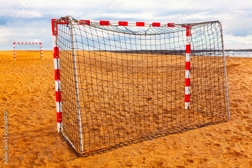 Football field on the beach . Seaside stadium . Sandy sport field photo