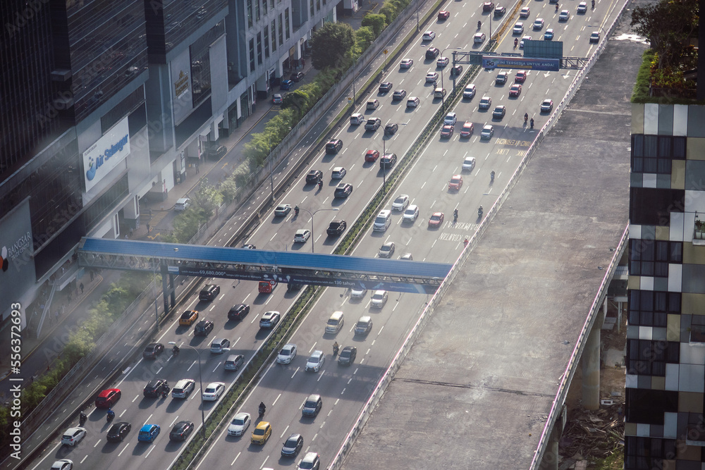 High angle view of roadway full of cars. Morning rush hour. Daylight view of highway.