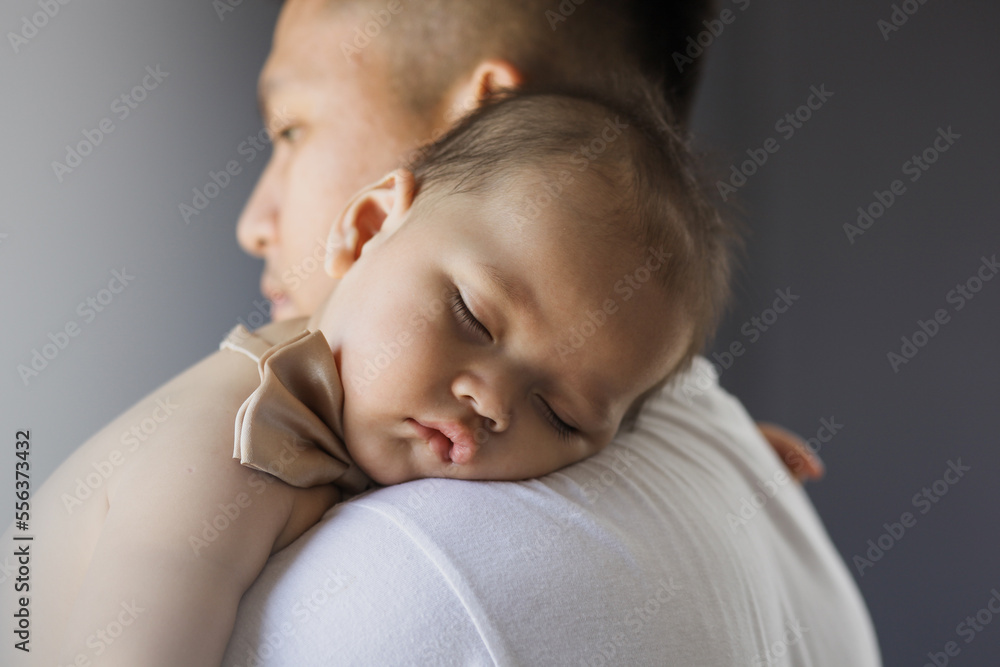 Portrait of baby sleep on father's shoulder Portrait of baby sleep on father's shoulder