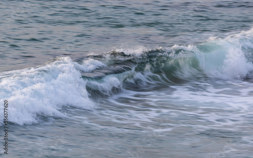 Breaking wave on the ocean shore.