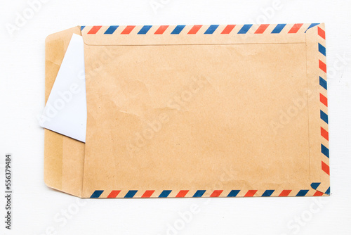 envelope post airmail for ducument business work arrangement flat lay style on background white photo