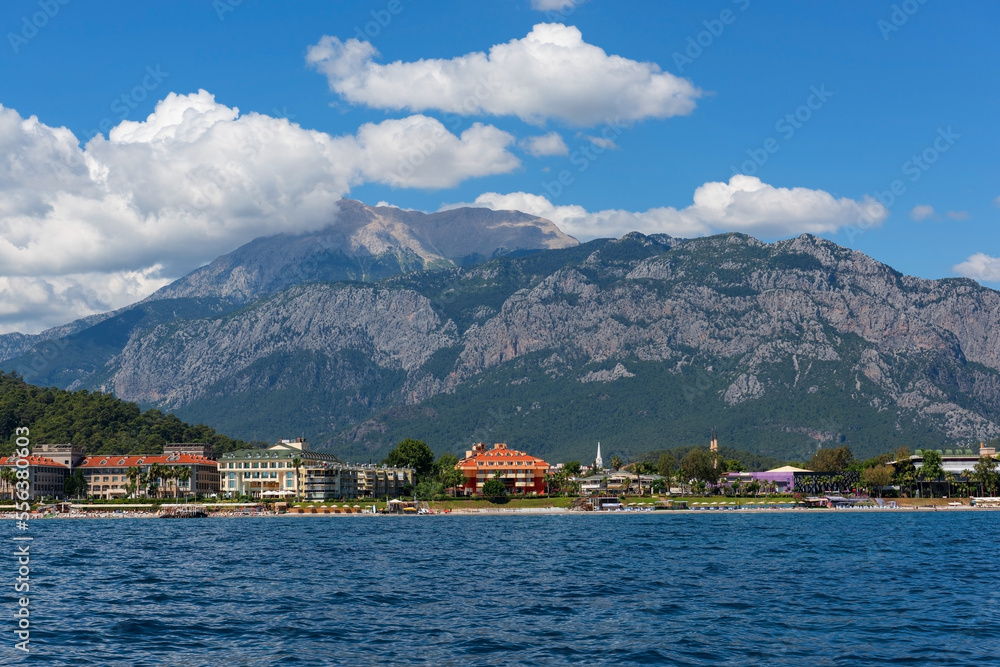 View from the sea to the hotels in the Turkish resort town of Kemer on a summer day