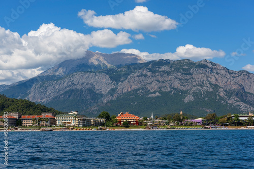 View from the sea to the hotels in the Turkish resort town of Kemer on a summer day