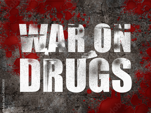 The word War on Drugs against a concrete floor splattered with blood. Crackdown on illegal drug trade and abuse.