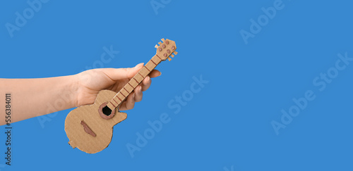Female hand with small card...