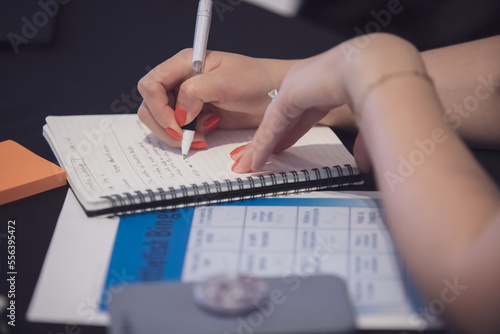 soft focus and blurred background , a business content strategist develops and implements content strategies for businesses, identifying target audiences, and analyzing the effectiveness of different.