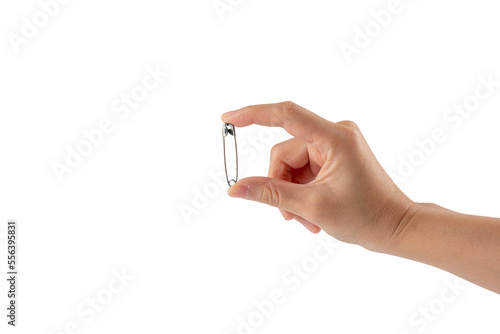 Hand holding metal safety pins isolated on transparent background, Close up