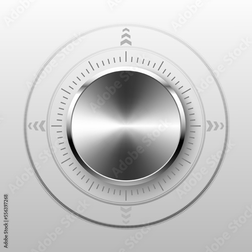 Round volume button sound control of silver shiny metal on gray background.