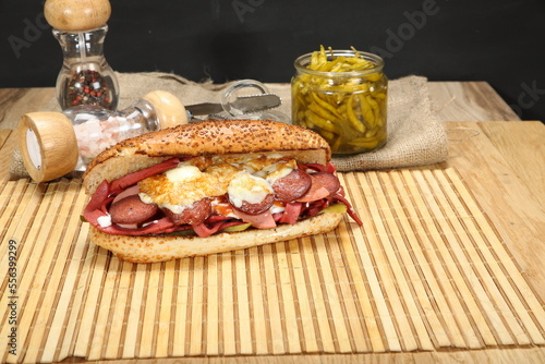 kumru sandwich with sausage, salami, sudjuk and cheddar cheese
