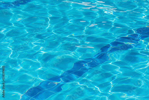 Blue ripped water in swiming pool