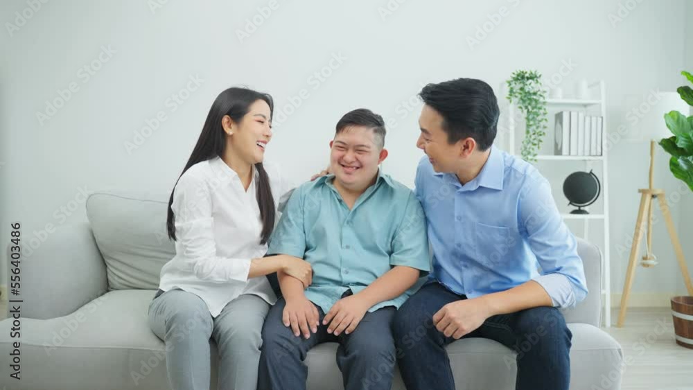 Portrait of attractive mature parent spend time with young son in home. Portrait of attractive mature parent spend time with young son in home.