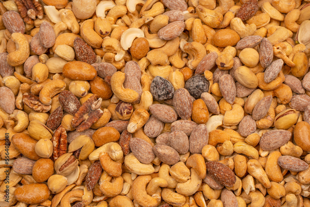 A group of almonds, pistachios, walnuts, macadamia, cashews. A group of almonds, pistachios, walnuts, macadamia, cashews.