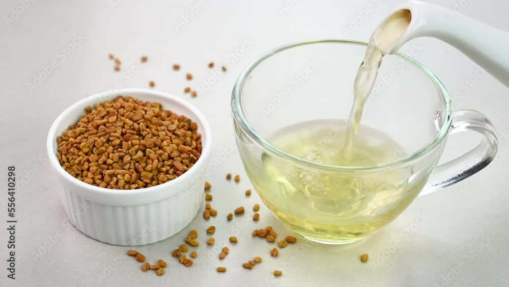 Serving fenugreek tea in a glass cup Serving fenugreek tea in a glass cup