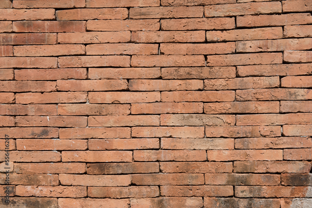 Fototapeta premium Orange brick background and texture.