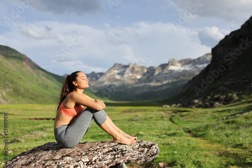 Yogi resting in nature after yoga exercise