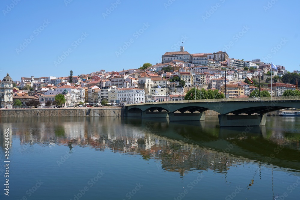 View to Santa Clara bridge over Mondego river in Coimbra, Portugal
