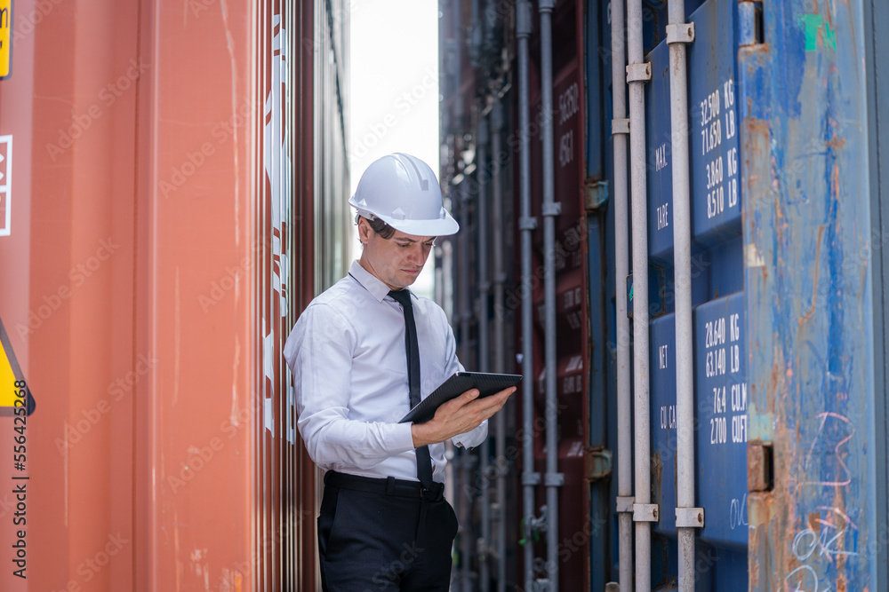 Engineer check goods and stock in industrial container terminal,Quality of product,Checking on shipping containers. Engineer check goods and stock in industrial container terminal,Quality of product,Checking on shipping containers.