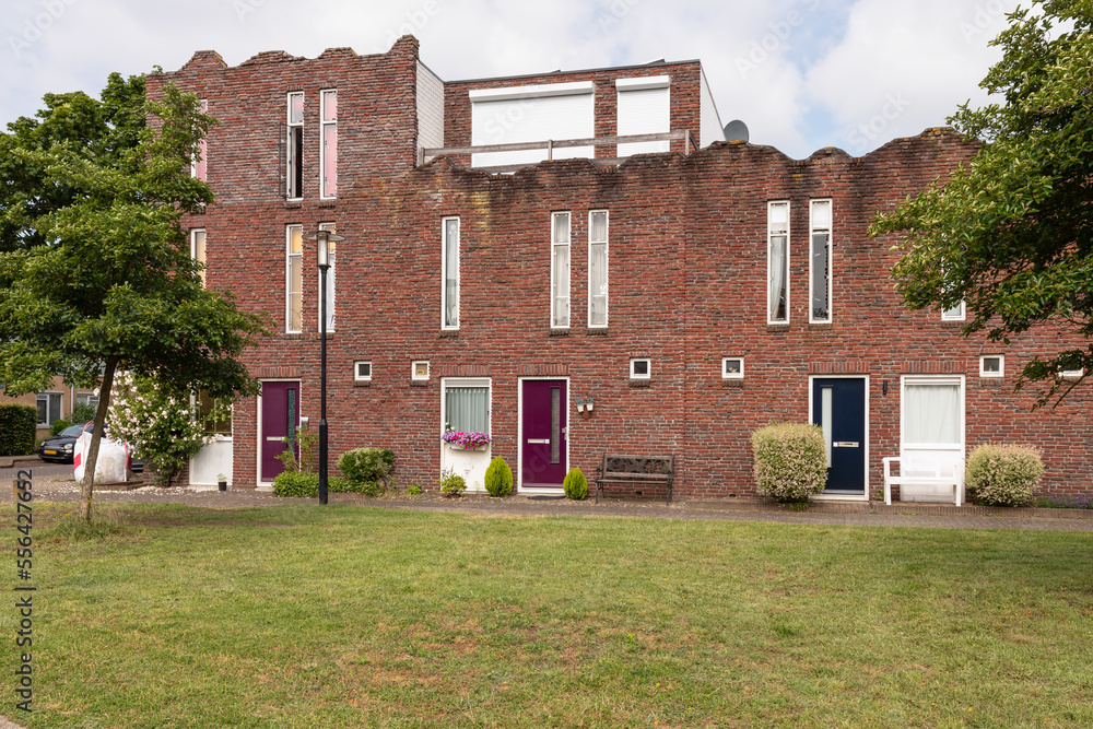 Houses with ruin-like front and side walls in the Kattenbroek district in Amersfoort in the Netherlands. Houses with ruin-like front and side walls in the Kattenbroek district in Amersfoort in the Netherlands.