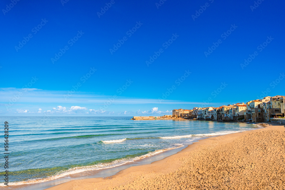Panoramic view of Cefalu beach with no people in Sicily, Italy