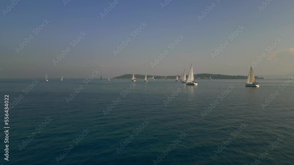 Aerial view of the Medium sized Yachts in the bay during race. Yacht sailing on open sea .Sailing aerial 4k video footage. High quality 4k footage Aerial view of the Medium sized Yachts in the bay during race. Yacht sailing on open sea .Sailing aerial 4k video footage. High quality 4k footage