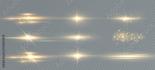Golden particles of light. Golden light. Light flare.Stars isolated on transparent background.