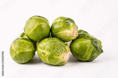 raw uncooked Brussel sprouts isolated on a white background