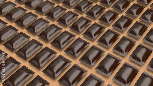 Many rows with brown sachets for confectionary products