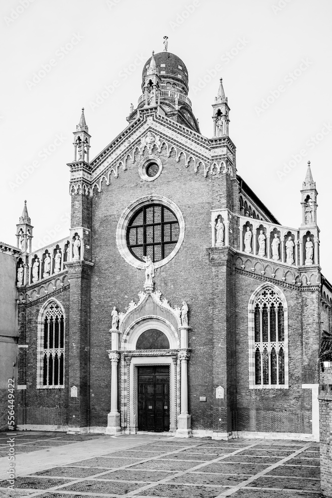 Facade of the gothic medieval church of Madonna dell'Orto; church of Madonna of the Garden; church of the Lady of the Garden in Venice, Italy in black and white Facade of the gothic medieval church of Madonna dell'Orto; church of Madonna of the Garden; church of the Lady of the Garden in Venice, Italy in black and white
