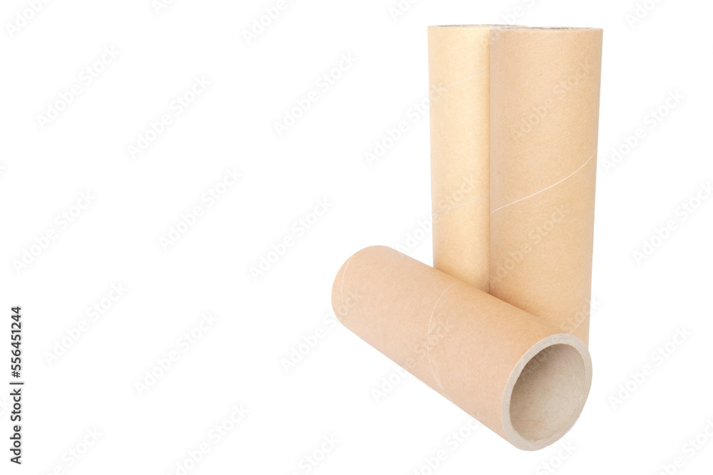 Pressed paper cylindrical tubes, on an isolated white background Pressed paper cylindrical tubes, on an isolated white background