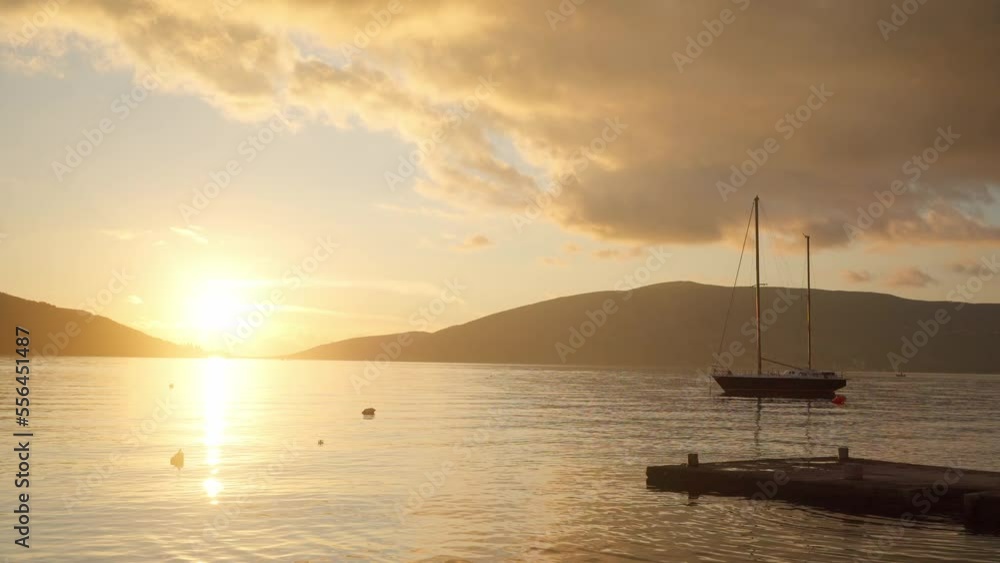 Sea view at sunset. Beautiful serene vmd on the evening sea in the bay Sea view at sunset. Beautiful serene vmd on the evening sea in the bay