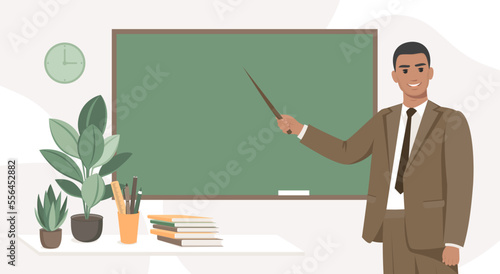Male teacher standing by blackboard in the classroom. Concept of education and training. Vector illustration
