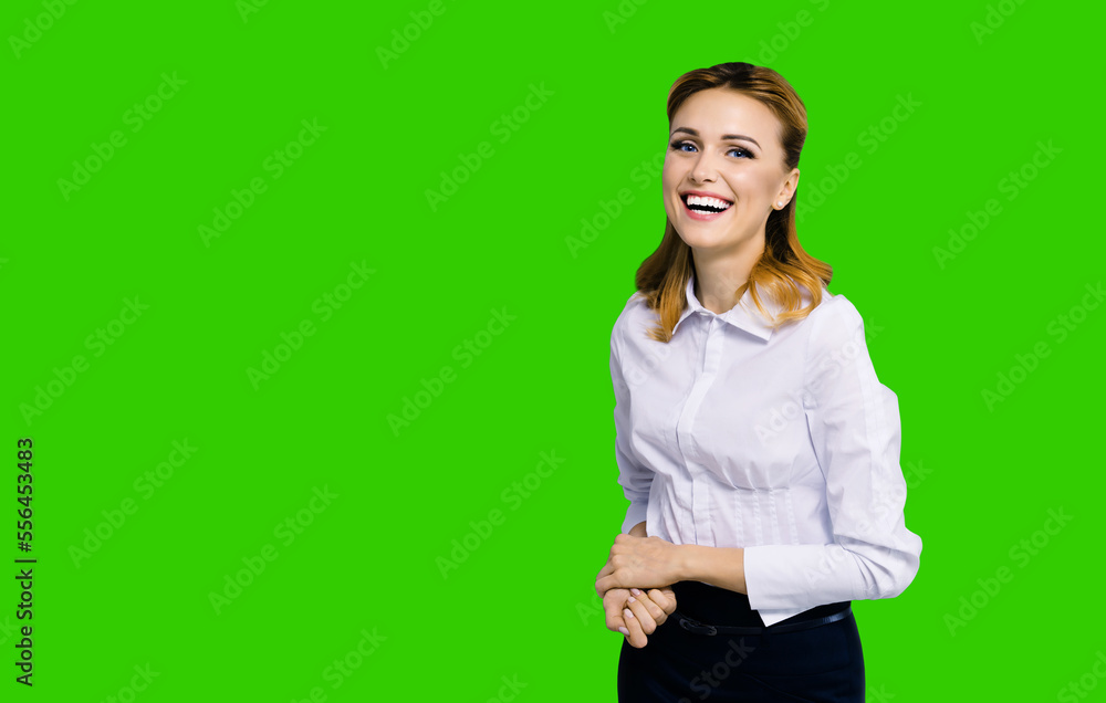 Happy smiling attractive businesswoman, with copy space area for some slogan or text. Confident blond woman in white shirt. Green chroma key background. Happy smiling attractive businesswoman, with copy space area for some slogan or text. Confident blond woman in white shirt. Green chroma key background.
