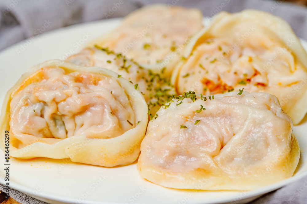 kimchimandu, Korean Kimchi dumpling : Kimchi dumplings are stuffed with a filling of chopped kimchi, bean curd, and vegetables. They are the most popular type of dumpling among Koreans. kimchimandu, Korean Kimchi dumpling : Kimchi dumplings are stuffed with a filling of chopped kimchi, bean curd, and vegetables. They are the most popular type of dumpling among Koreans.