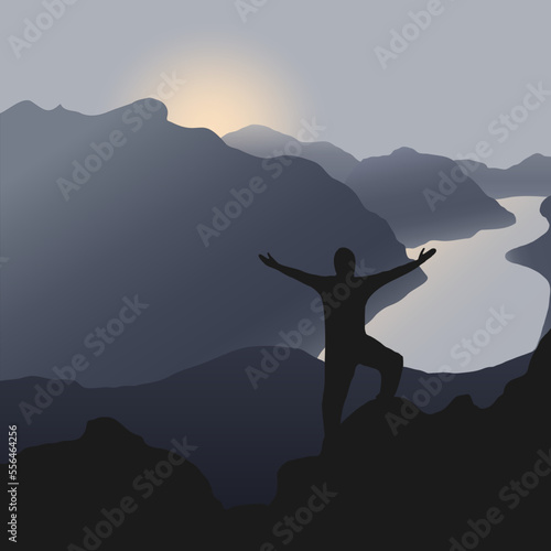 Silhouette of a person on a mountain top