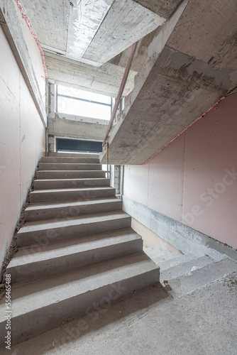 Unfinished concrete staircases on a buiiliding site. Construction. Unfinished building. Stair hall