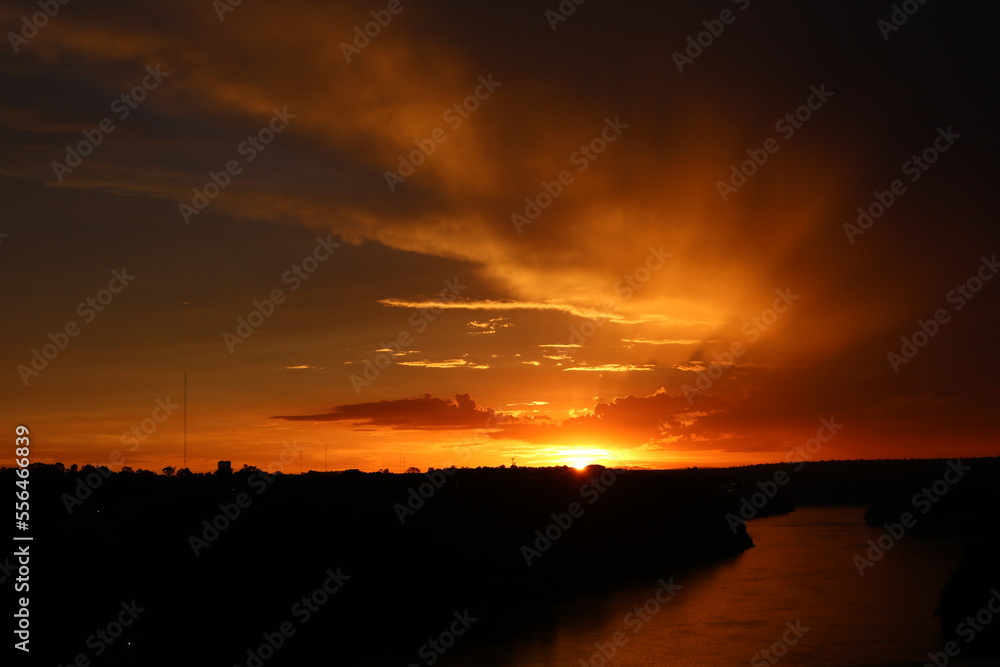 Fototapeta premium sunset over the river