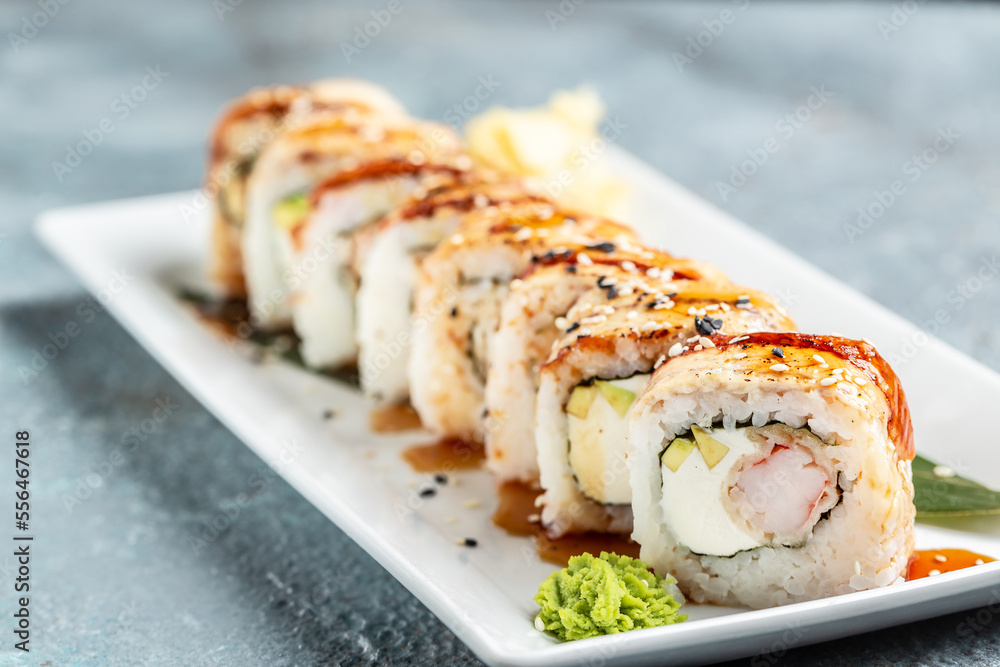 Sushi roll sushi with prawn, avocado, cream cheese, sesame. Sushi menu. restaurant. Seafood, asian food Sushi roll sushi with prawn, avocado, cream cheese, sesame. Sushi menu. restaurant. Seafood, asian food