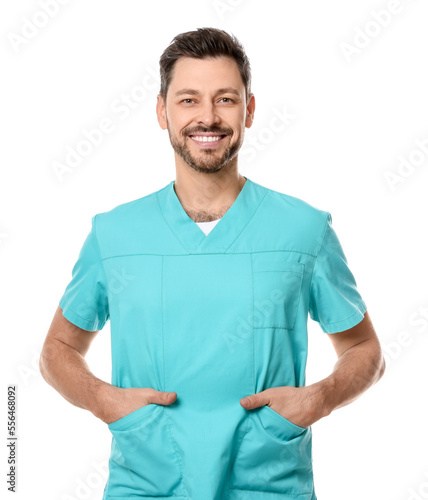 Doctor or medical assistant (male nurse) in uniform on white background © New Africa